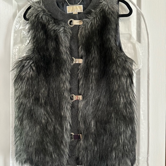 Michael Kors Jackets & Blazers - Michael Kors ❤️ Faux Fur Vest Women’s Size Large $450.
~Never Worn~